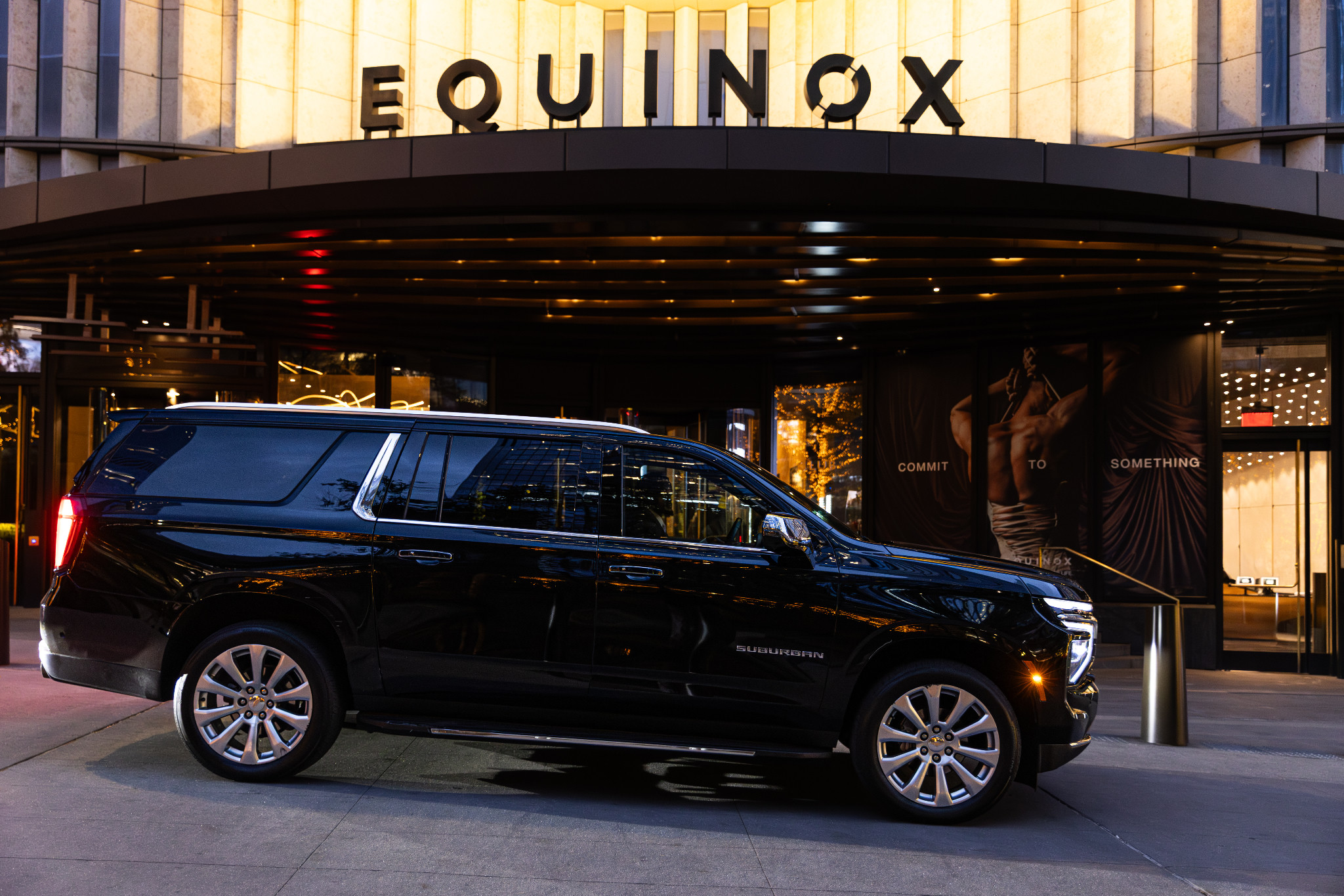 Full side view of a black Chevrolet Suburban
