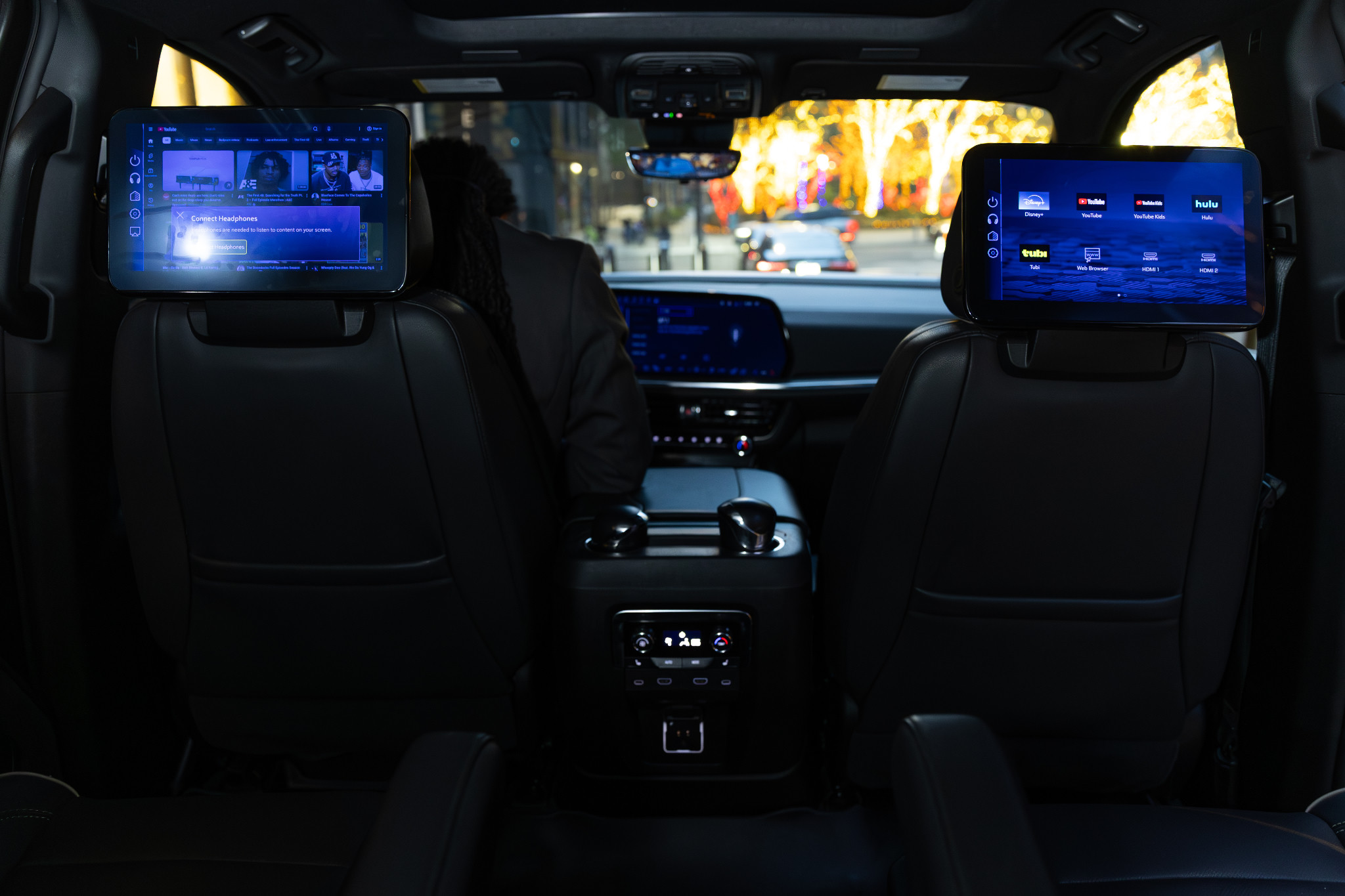 Rear cabin view with two entertainment screens